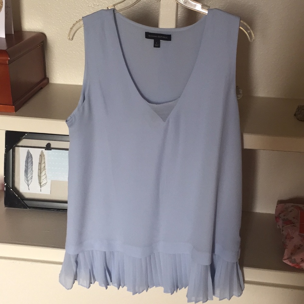 Blue sleeveless blouse